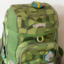 X-Našívání nášivek na školní batohy