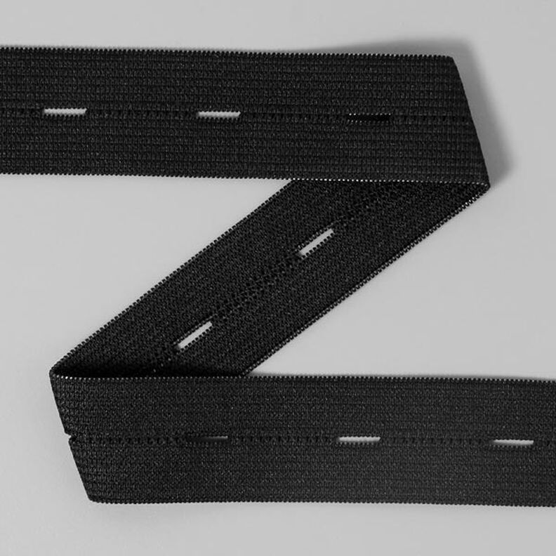Elastická guma s dírkami na knoflíky 580 – černá | YKK,  image number 1