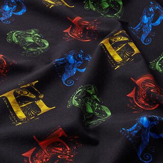 Bavlněný žerzej Licenční látky Harry Potter, iniciály a heraldická zvířata | Warner Bros. – černá, 